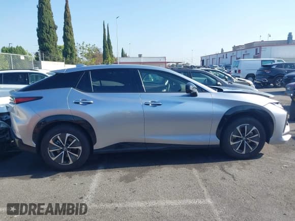 ✅ 2024 Lexus RZ 300e Premium • VIN: JTJABABBXRA003009 • Lot: 42297557. Listed on IAAI with 10,092 mi. Free auction sales archive from the USA and detailed vehicle history report at DreamBid. Image 13.