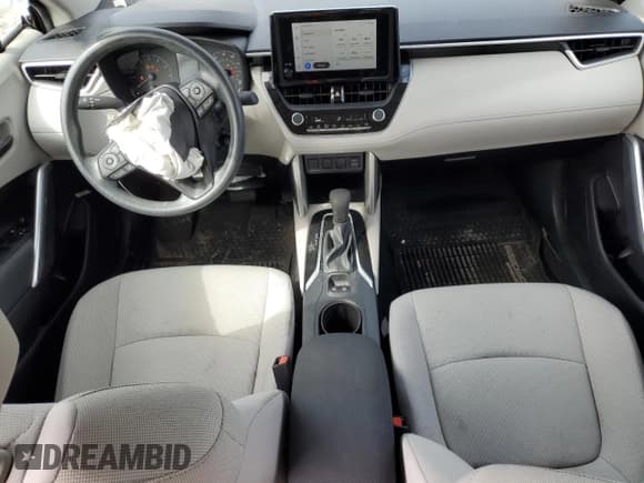 ✅ 2023 Toyota Corolla Cross L • VIN: 7MUAAAAG3PV050682 • Lot: 80054275. Listed on Copart with 51,704 mi. Free auction sales archive from the USA and detailed vehicle history report at DreamBid. Image 8.