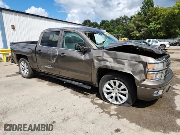 ✅ 2015 Chevrolet Silverado 1500 LTZ • VIN: 3GCPCSEC1FG389269 • Lot: 82091975. Listed on Copart with 199,423 mi. Free auction sales archive from the USA and detailed vehicle history report at DreamBid. Image 4.