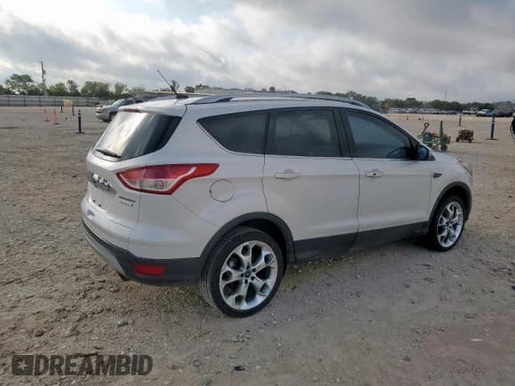 ✅ 2014 Ford Escape Titanium • VIN: 1FMCU0JX4EUA04707 • Лот: 90485195. Опубликован ранее на Copart с пробегом 142 538 миль. Бесплатный доступ к архиву аукционных продаж из США и подробный отчёт об истории автомобиля на DreamBid. Изображение 3.