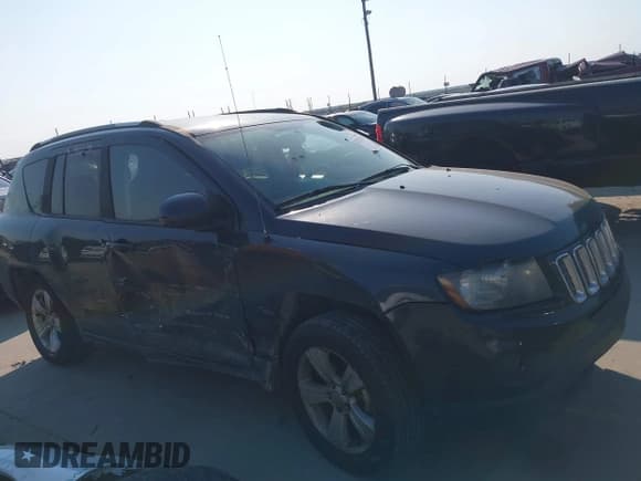 ✅ 2015 Jeep Compass High Altitude • VIN: 1C4NJDEBXFD217092 • Lot: 43237256. Listed on IAAI with 161,684 mi. Free auction sales archive from the USA and detailed vehicle history report at DreamBid. Image 13.