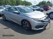 ✅ 2017 Honda Civic Touring • VIN: 2HGFC3B90HH358545 • Lot: 43118739. Listed on IAAI with 35,930 mi. Free auction sales archive from the USA and detailed vehicle history report at DreamBid. Image 1.