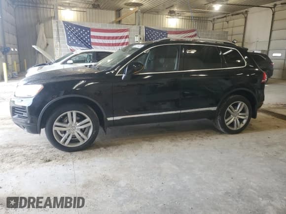 ✅ 2014 Volkswagen Touareg Exec • VIN: WVGEP9BP6ED012830 • Lot: 55021435. Wystawiony na Copart z przebiegiem 127 072 mil. Bezpłatny archiwum sprzedaży aukcyjnych z USA i szczegółowy raport historii pojazdu na DreamBid. Zdjęcie 1.
