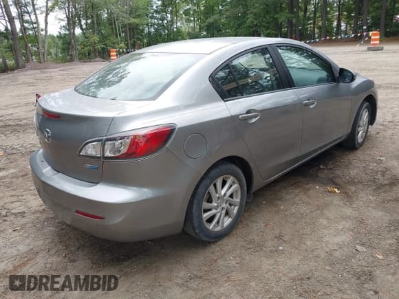 ✅ 2012 Mazda 3 i Touring • VIN: JM1BL1V84C1693996 • Lot: 43225641. Listed on IAAI with 125,243 mi. Free auction sales archive from the USA and detailed vehicle history report at DreamBid. Image 4.