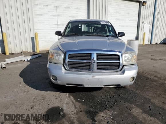 2006 Dodge Dakota SLT с VIN 1D7HE48KX6S505693, выставлен на аукционе Copart как лот 80316214 с пробегом 221 637 миль миль и Списание • Salvage title. История ставок и продаж доступна на DreamBid. Изображение 5.
