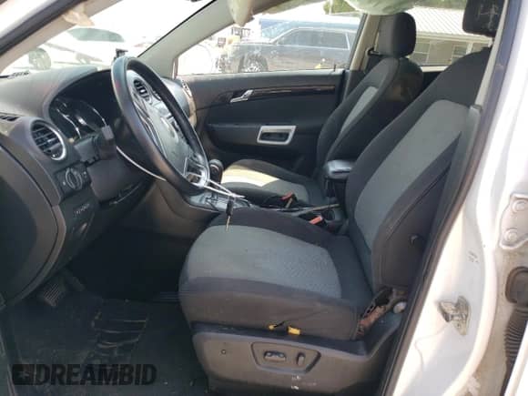 2014 Chevrolet Captiva Sport LS with VIN 3GNAL2EK7ES564267, listed as a Copart auction lot 68821054 with 76,529 mi miles and Clean title. Bid and sale history available at DreamBid. Image 7.