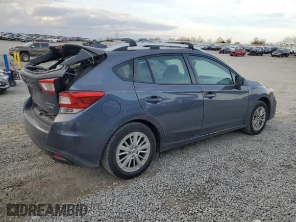 ✅ 2017 Subaru Impreza Premium • VIN: 4S3GTAB62H3733867 • Lot: 93071085. Listed on Copart with 72,927 mi. Free auction sales archive from the USA and detailed vehicle history report at DreamBid. Image 3.