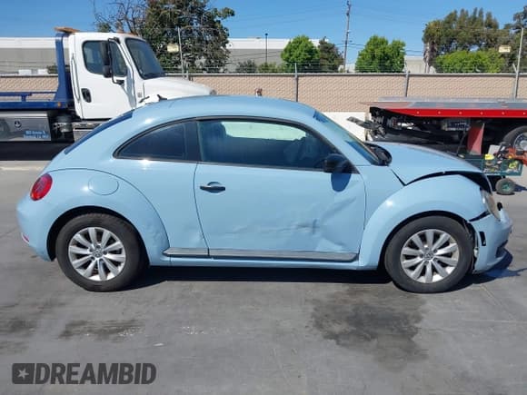 ✅ 2015 Volkswagen Beetle Fleet Edition • VIN: 3VWF17AT6FM639589 • Lot: 42538753. Listed on IAAI with 104,935 mi. Free auction sales archive from the USA and detailed vehicle history report at DreamBid. Image 13.