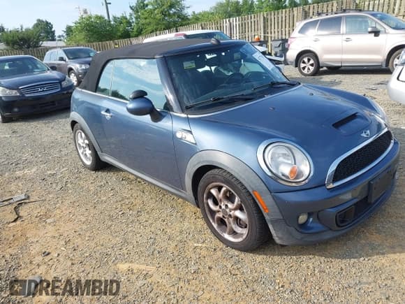 ✅ 2011 MINI Convertible S • VIN: WMWZP3C51BTX83355 • Lot: 42775679. Listed on IAAI with 120,007 mi. Free auction sales archive from the USA and detailed vehicle history report at DreamBid. Image 1.