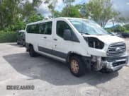 ✅ 2018 Ford Transit Passenger XL • VIN: 1FBZX2ZM4JKA10500 • Lot: 43160474. Listed on IAAI with 140,850 mi. Free auction sales archive from the USA and detailed vehicle history report at DreamBid. Image 1.