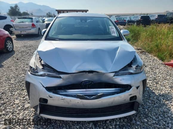 2021 Toyota Prius L Eco with VIN JTDKAMFU1M3150517, listed as a Copart auction lot 70697765 with 107,800 mi miles and Salvage title. Bid and sale history available at DreamBid. Image 5.