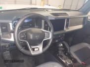 ✅ 2024 Ford Bronco Outer Banks • VIN: 1FMDE8BH4RLB07869 • Lot: 43905481. Listed on IAAI with 4,185 mi. Free auction sales archive from the USA and detailed vehicle history report at DreamBid. Image 17.