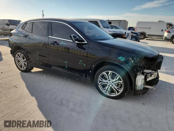 ✅ 2022 BMW X2 xDrive28i • VIN: WBXYJ1C02N5U19529 • Lot: 82496685. Listed on Copart with 86,230 mi. Free auction sales archive from the USA and detailed vehicle history report at DreamBid. Image 4.