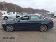 ✅ 2016 Ford Fusion Titanium • VIN: 3FA6P0K91GR261347 • Lot: 43737815. Listed on IAAI with 205,791 mi. Free auction sales archive from the USA and detailed vehicle history report at DreamBid. Image 14.