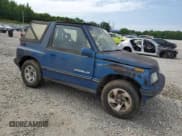 ✅ 1993 Geo Tracker • VIN: 2CNBJ18UXP6921660 • Лот: 58027275. Опубликован ранее на Copart с пробегом 64 349 миль. Бесплатный доступ к архиву аукционных продаж из США и подробный отчёт об истории автомобиля на DreamBid. Изображение 4.