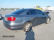 ✅ 2011 Volkswagen Jetta SEL • VIN: 3VWLX7AJ4BM035940 • Lot: 43735911. Listed on IAAI with 197,431 mi. Free auction sales archive from the USA and detailed vehicle history report at DreamBid. Image 4.