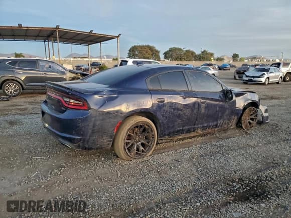 ✅ 2015 Dodge Charger RT • VIN: 2C3CDXCT5FH838825 • Lot: 94729745. Listed on Copart with 139,958 mi. Free auction sales archive from the USA and detailed vehicle history report at DreamBid. Image 3.