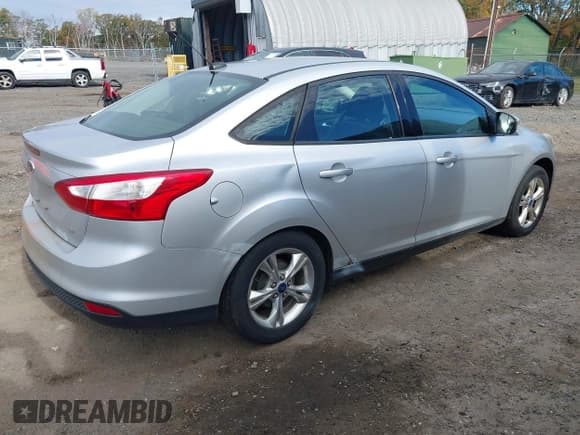✅ 2014 Ford Focus SE • VIN: 1FADP3F23EL248911 • Lot: 43486723. Listed on IAAI with 133,164 mi. Free auction sales archive from the USA and detailed vehicle history report at DreamBid. Image 4.
