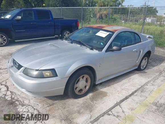 ✅ 2001 Ford Mustang Standard • VIN: 1FAFP40431F261174 • Lot: 43045615. Listed on IAAI with Not provided. Free auction sales archive from the USA and detailed vehicle history report at DreamBid. Image 2.