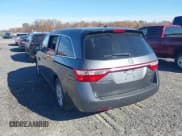 ✅ 2012 Honda Odyssey Touring • VIN: 5FNRL5H96CB103962 • Lot: 43587214. Listed on IAAI with 169,916 mi. Free auction sales archive from the USA and detailed vehicle history report at DreamBid. Image 3.