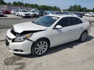 ✅ 2015 Chevrolet Malibu LTZ • VIN: 1G11G5SX1FF124154 • Lot: 62260245. Listed on Copart with 119,704 mi. Free auction sales archive from the USA and detailed vehicle history report at DreamBid. Image 1.