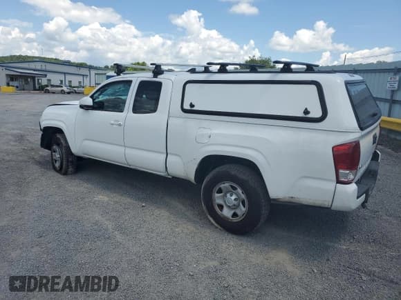 ✅ 2016 Toyota Tacoma SR • VIN: 5TFSX5EN2GX043729 • Lot: 66354905. Listed on Copart with 167,362 mi. Free auction sales archive from the USA and detailed vehicle history report at DreamBid. Image 2.