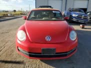 ✅ 2014 Volkswagen Beetle 2.0L TDI • VIN: 3VW5L7AT9EM804409 • Lot: 62685905. Listed on Copart with 91,277 mi. Free auction sales archive from the USA and detailed vehicle history report at DreamBid. Image 5.