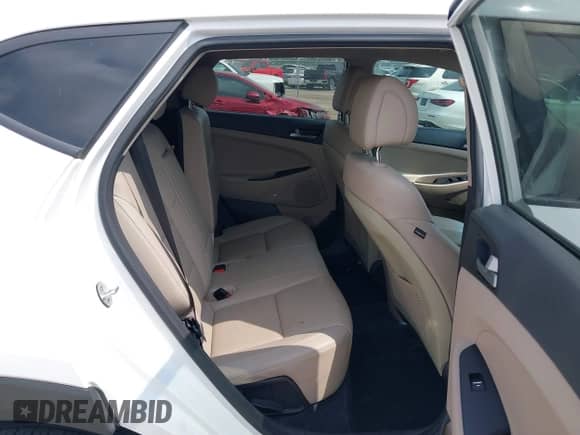 2018 Hyundai Tucson Limited with VIN KM8J33A22JU677697, listed as a IAAI auction lot 41780870 with 93,992 mi miles and . Bid and sale history available at DreamBid. Image 8.