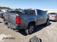 ✅ 2018 Chevrolet Colorado 4WD Z71 • VIN: 1GCGTDEN8J1272549 • Лот: 72601324. Опубликован ранее на Copart с пробегом 26 329 миль. Бесплатный доступ к архиву аукционных продаж из США и подробный отчёт об истории автомобиля на DreamBid. Изображение 3.