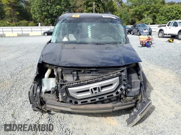 ✅ 2011 Honda Pilot EX-L • VIN: 5FNYF4H51BB077750 • Lot: 82295545. Listed on Copart with 148,321 mi. Free auction sales archive from the USA and detailed vehicle history report at DreamBid. Image 5.
