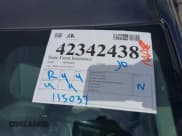 ✅ 2018 Honda Civic EX-T • VIN: JHMFC1F38JX020125 • Lot: 42342438. Listed on IAAI with 115,037 mi. Free auction sales archive from the USA and detailed vehicle history report at DreamBid. Image 18.