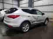 2014 Hyundai Santa Fe z VIN 5XYZW3LA4EG205141, wystawiony jako Copart lot #65400145 z przebiegiem 135 224 mil mil oraz Szkoda całkowita • Salvage title. Historia ofert i sprzedaży dostępna na DreamBid. Obrazek 3.