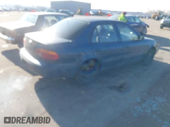 ✅ 2002 Chevrolet Prizm • VIN: 1Y1SK52892Z415184 • Лот: 41352387. Опубликован ранее на IAAI с пробегом 184 991 миль. Бесплатный доступ к архиву аукционных продаж из США и подробный отчёт об истории автомобиля на DreamBid. Изображение 4.