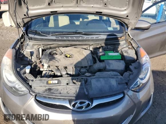 2013 Hyundai Elantra GLS z VIN 5NPDH4AE2DH199878, wystawiony jako Copart lot #82063035 z przebiegiem 69 211 mil mil oraz Szkoda całkowita • Salvage title. Historia ofert i sprzedaży dostępna na DreamBid. Obrazek 11.