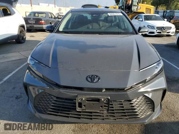 2025 Toyota Camry LE with VIN 4T1DAACK8SU067003, listed as a Copart auction lot 84061975 with 9,394 mi miles and Salvage title. Bid and sale history available at DreamBid. Image 5.