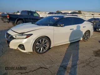 ✅ 2021 Nissan Maxima Platinum • VIN: 1N4AA6FV8MC501056 • Lot: 94595065. Listed on Copart with 71,279 mi. Free auction sales archive from the USA and detailed vehicle history report at DreamBid. Image 1.