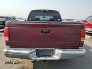 2000 Dodge Dakota Sport z VIN 1B7GG2AN1YS699073, wystawiony jako Copart lot #70782284 z przebiegiem 141 876 mil mil oraz Szkoda całkowita • Salvage title. Historia ofert i sprzedaży dostępna na DreamBid. Obrazek 6.