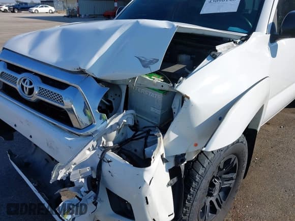 ✅ 2015 Toyota Tacoma PreRunner • VIN: 5TFKU4HN6FX006874 • Lot: 43090148. Listed on IAAI with 182,527 mi. Free auction sales archive from the USA and detailed vehicle history report at DreamBid. Image 6.