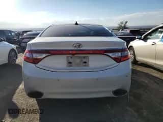2013 Hyundai Azera z VIN KMHFH4JG8DA206183, wystawiony jako Copart lot #73785074 z przebiegiem 144 303 mil mil oraz Szkoda całkowita • Salvage title. Historia ofert i sprzedaży dostępna na DreamBid. Obrazek 6.