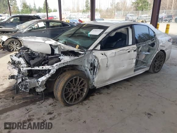 2023 Toyota Camry SE with VIN 4T1G11BK2PU099094, listed as a IAAI auction lot 41403372 with 57,261 mi miles and . Bid and sale history available at DreamBid. Image 17.