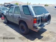 ✅ 1992 Isuzu Rodeo • VIN: 4S2CG58E4N4300411 • Lot: 42593697. Listed on IAAI with 158,963 mi. Free auction sales archive from the USA and detailed vehicle history report at DreamBid. Image 3.