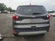 ✅ 2019 Ford Escape SE • VIN: 1FMCU9GDXKUA48739 • Lot: 67376565. Wystawiony na Copart z przebiegiem 58 059 mil. Bezpłatny archiwum sprzedaży aukcyjnych z USA i szczegółowy raport historii pojazdu na DreamBid. Zdjęcie 6.