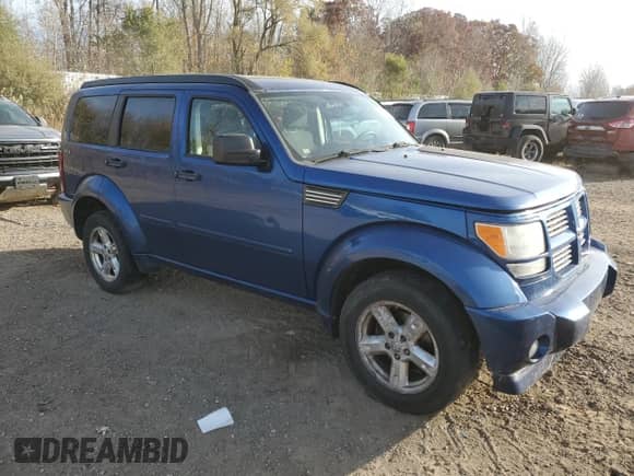 2010 Dodge Nitro SXT z VIN 1D4PU5GK4AW127309, wystawiony jako Copart lot #77405514 z przebiegiem 247 526 mil mil oraz Czysty tytuł • Clean title. Historia ofert i sprzedaży dostępna na DreamBid. Obrazek 4.