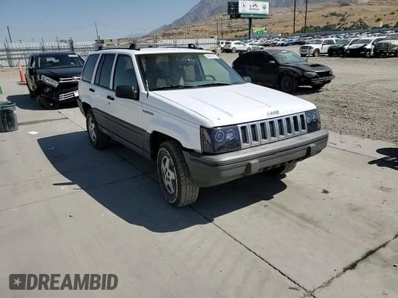 ✅ 1994 Jeep Grand Cherokee Laredo • VIN: 1J4GZ58S6RC310800 • Лот: 64095725. Опубликован ранее на Copart с пробегом 241 876 миль. Бесплатный доступ к архиву аукционных продаж из США и подробный отчёт об истории автомобиля на DreamBid. Изображение 13.