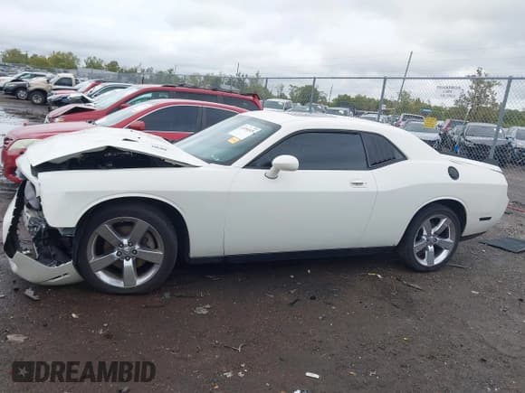 ✅ 2009 Dodge Challenger R/T • VIN: 2B3LJ54T39H572394 • Lot: 43354529. Wystawiony na IAAI z przebiegiem 152 919 mil. Bezpłatny archiwum sprzedaży aukcyjnych z USA i szczegółowy raport historii pojazdu na DreamBid. Zdjęcie 14.