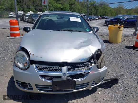 2004 Dodge Neon SXT z VIN 1B3ES56C44D580657, wystawiony jako IAAI lot #42137299 z przebiegiem 138 918 mil mil oraz . Historia ofert i sprzedaży dostępna na DreamBid. Obrazek 12.