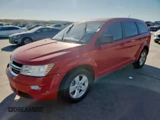 2013 Dodge Journey American Value with VIN 3C4PDCAB0DT555883, listed as a Copart auction lot 82441375 with 203,215 mi miles and Salvage title. Bid and sale history available at DreamBid. Image 1.