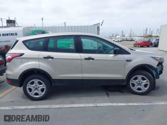 ✅ 2018 Ford Escape S • VIN: 1FMCU0F76JUA99595 • Lot: 42369434. Listed on IAAI with 19,207 mi. Free auction sales archive from the USA and detailed vehicle history report at DreamBid. Image 14.