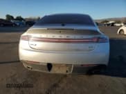 ✅ 2013 Lincoln MKZ Hybrid • VIN: 3LN6L2LUXDR812080 • Lot: 90634885. Wystawiony na Copart z przebiegiem 154 856 mil. Bezpłatny archiwum sprzedaży aukcyjnych z USA i szczegółowy raport historii pojazdu na DreamBid. Zdjęcie 6.