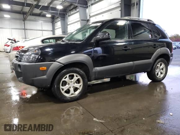 2009 Hyundai Tucson SE with VIN KM8JN12D79U114445, listed as a Copart auction lot 76508704 with 162,112 mi miles and Salvage title. Bid and sale history available at DreamBid. Image 1.
